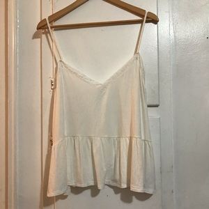 Peplum tank top with lace detail